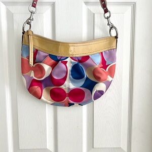 Coach Multicolor Signature Canvas cross body Bag with Pink Strap Accents